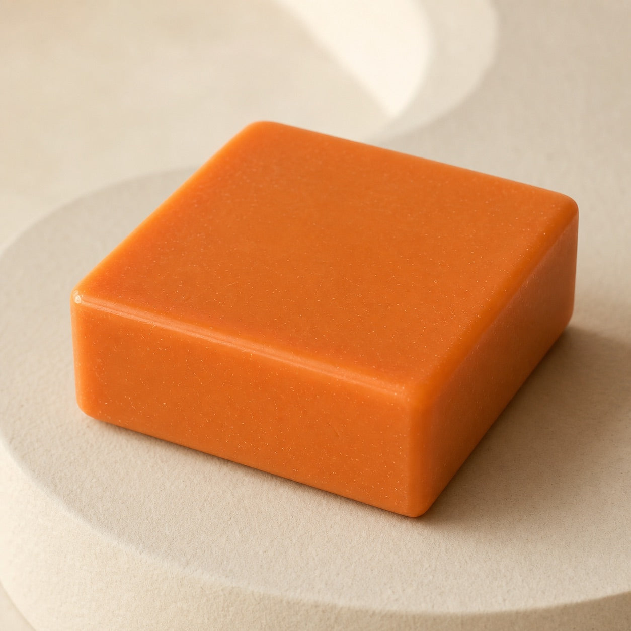 Close-up of the orange ABLUVO body cleansing bar